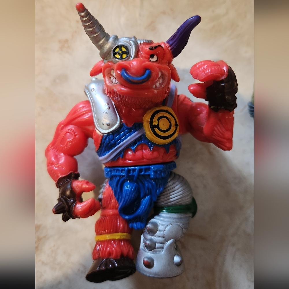 1990's Teenage Mutant Ninja Turtles (TMNT) action figure.